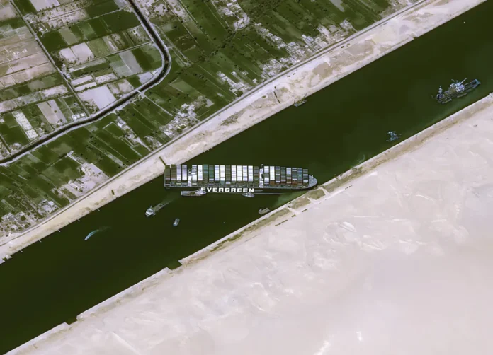 Evergreen A massive container ship's embarrassing and inconvenient predicament is visible from space.